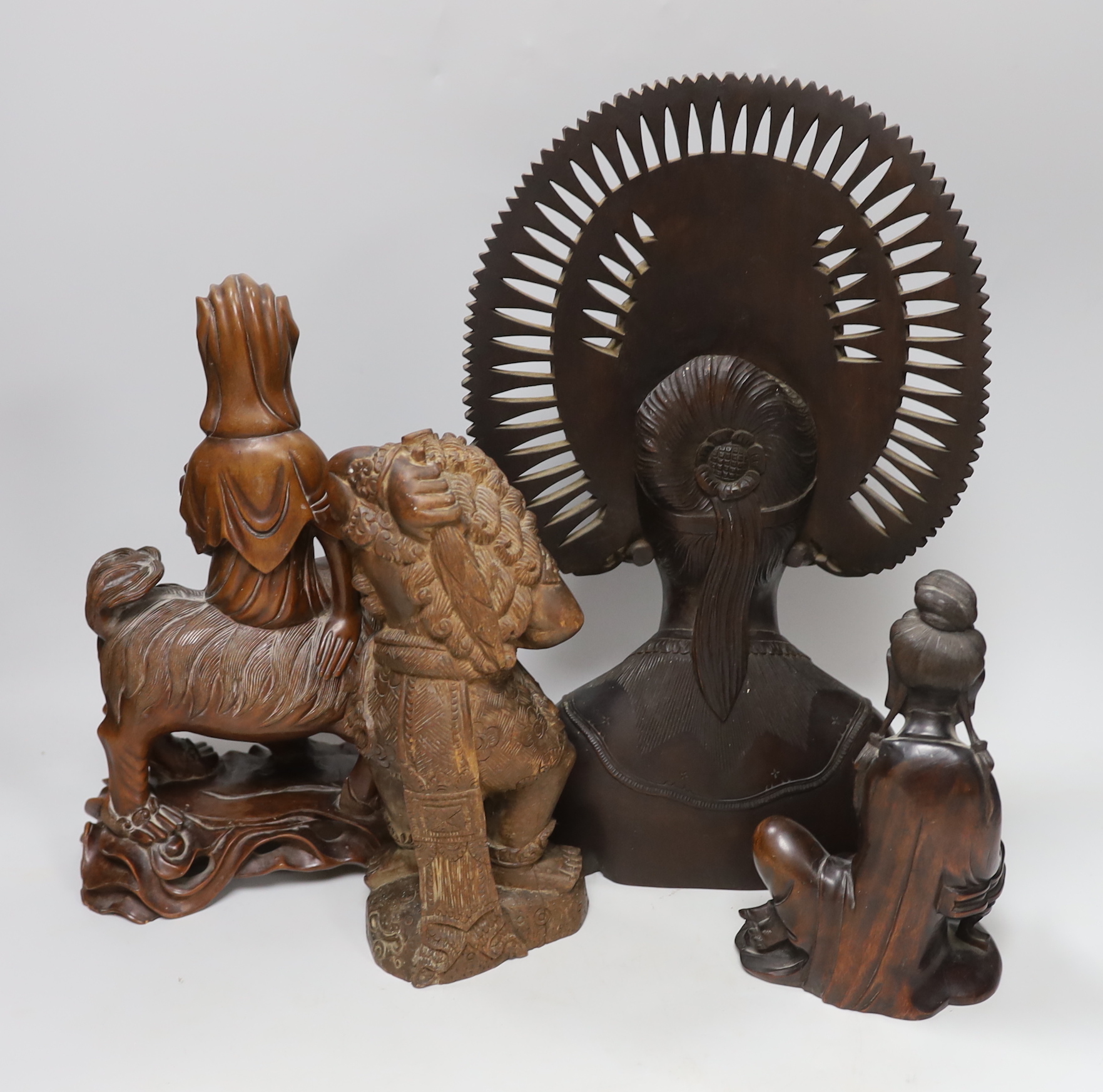 Four South East Asian carved hardwood figures, tallest 38cm